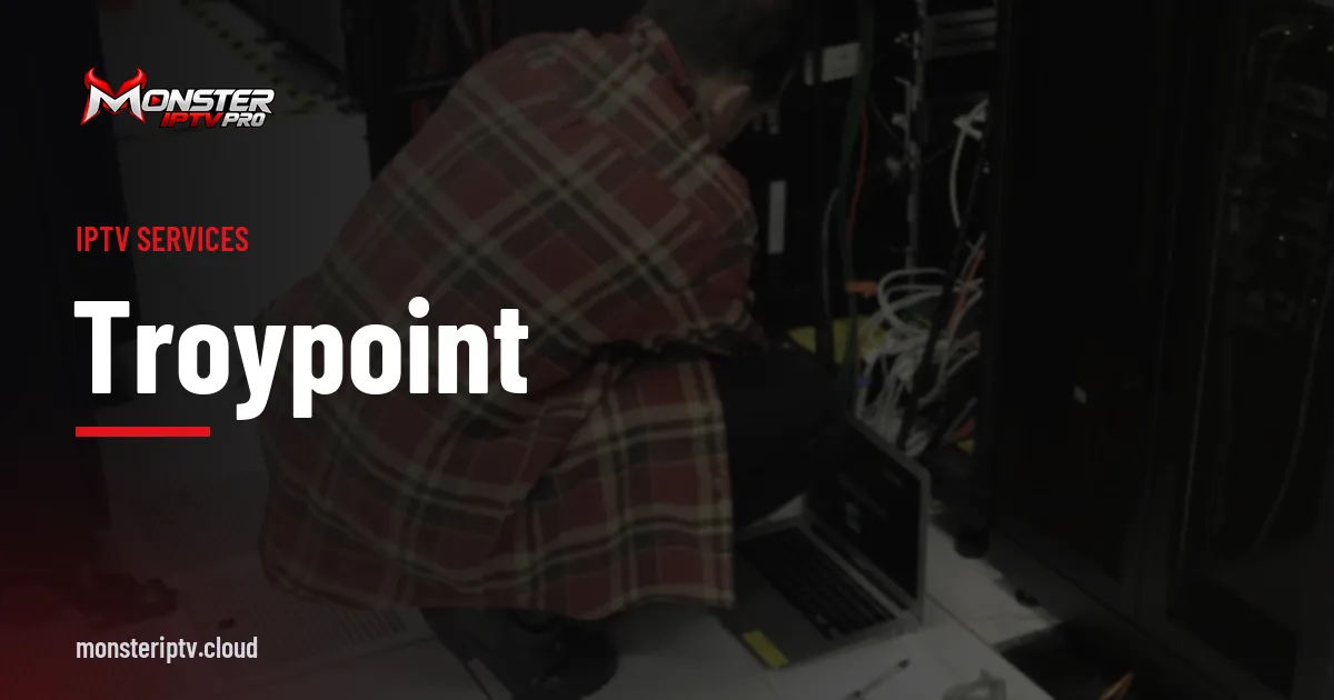 TROYPOINT banner over a technician working at a server rack in a data centre